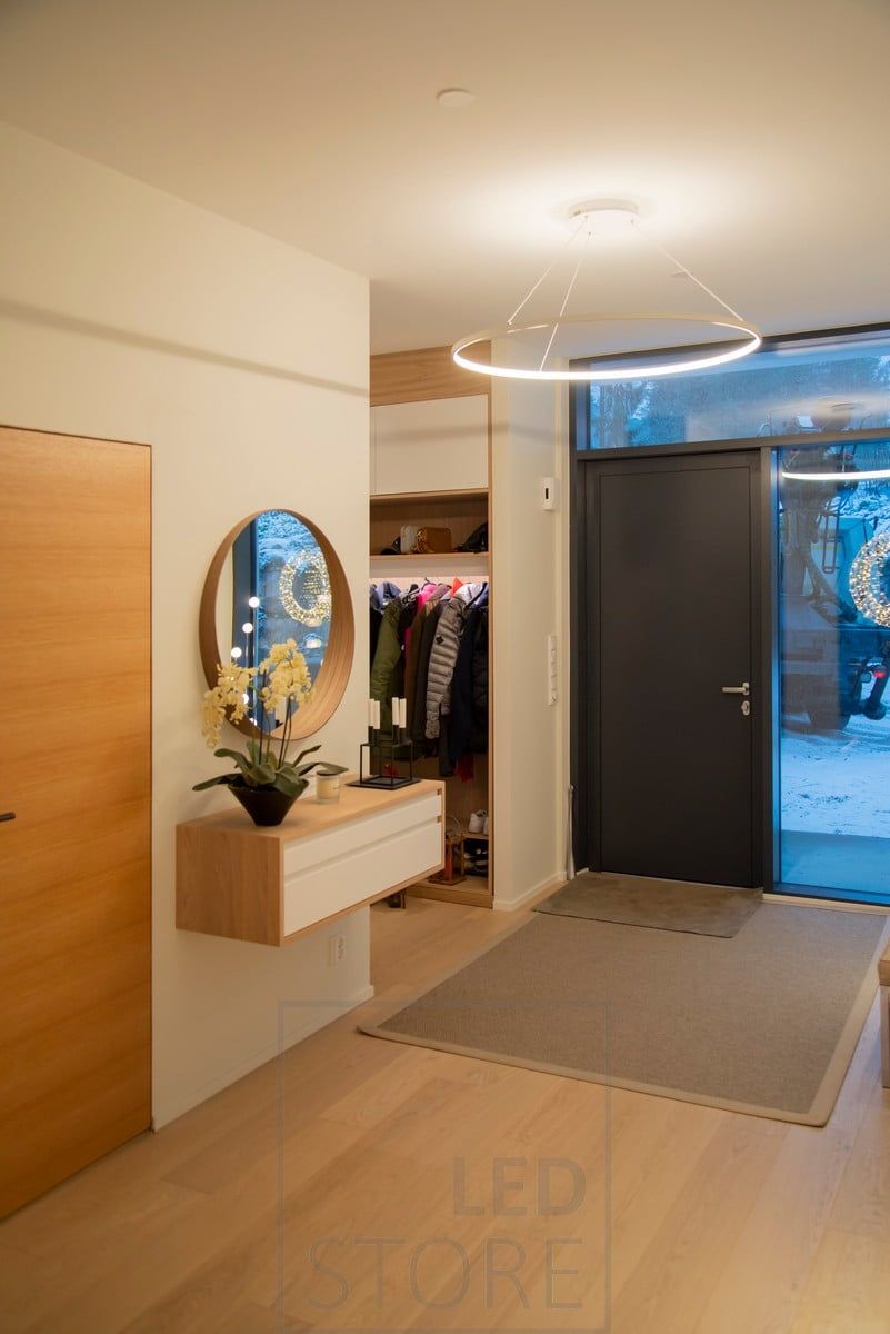 RINKELI in the hallway. The lamp has a diameter of 100cm and is an impressive part of the hallway decoration. Ledstore.fi