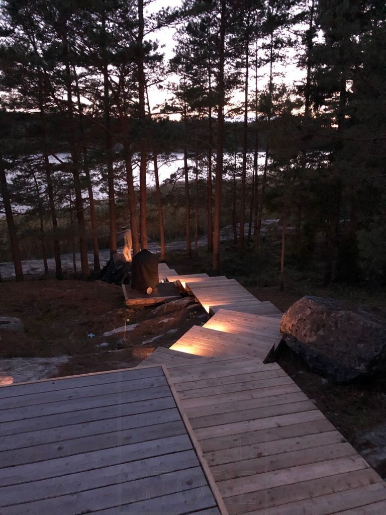 1W spotlight on each step of the external staircase to illuminate the steps and highlight them in the dark. Ledstore.fi
