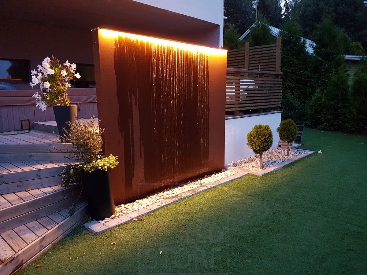 Water element accent with LED strip, also indirectly illuminates the courtyard. Ledstore.fi