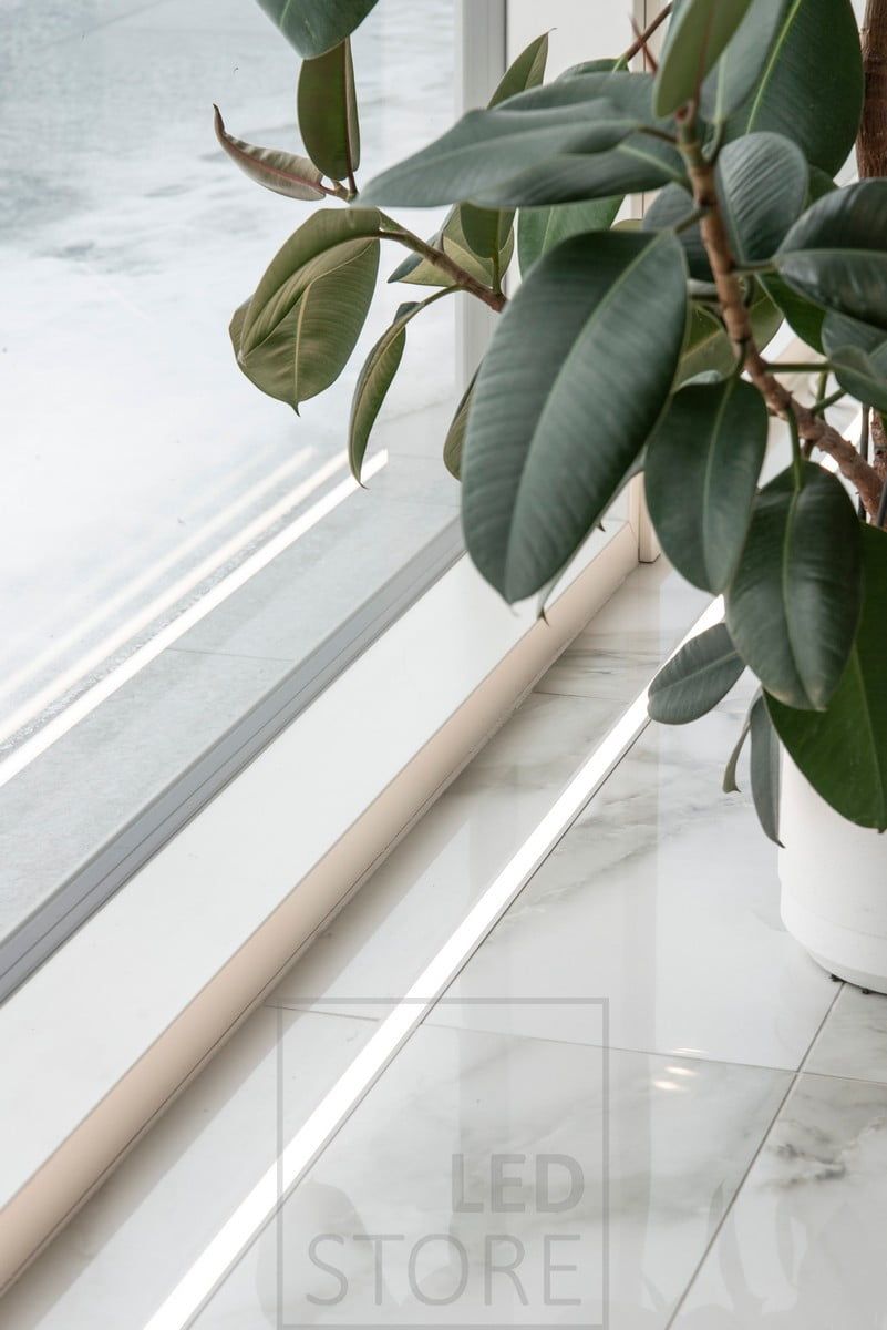 In front of the windows, the floor is accentuated by a LED ribbon in the uppermost profile. The led strip on the floor also highlights the beautiful marble tile. Ledstore.fi