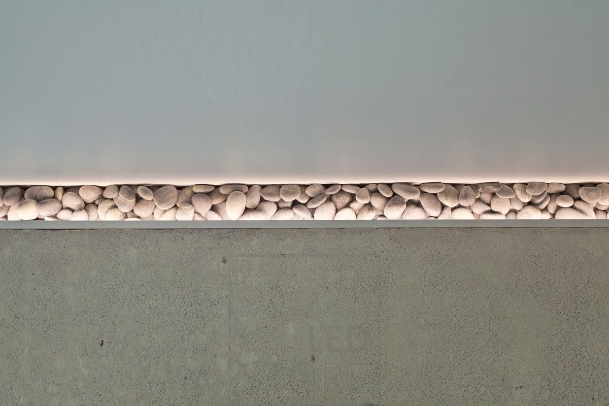 Led ribbon highlighting the floor recess and the stones in it. Ledstore.fi