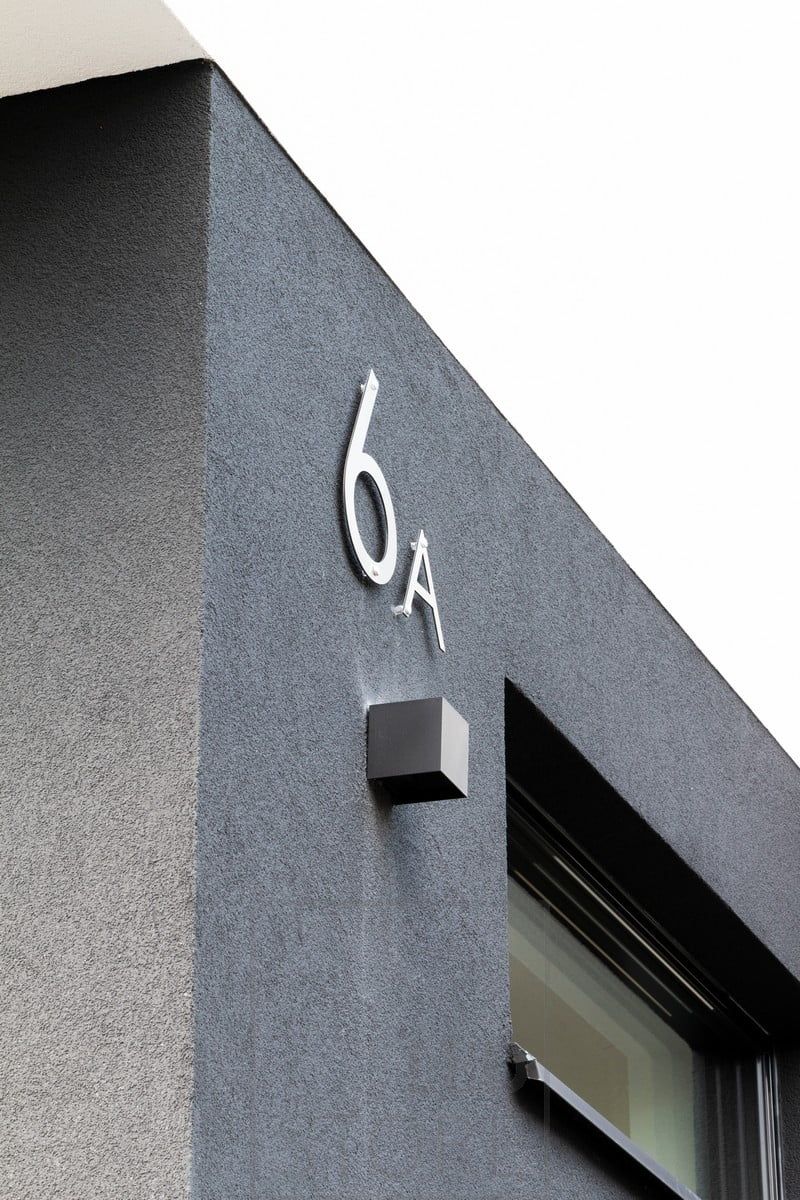 Highlighting a house number with a light from the bottom up. Ledstore.fi