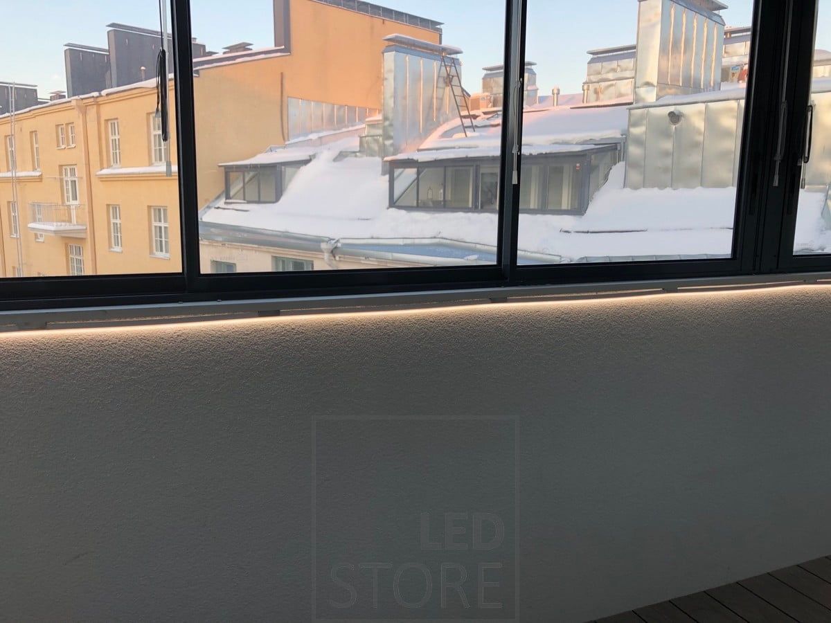 Led NEON strip light mounted under windows to illuminate with atmospheric light. Ledstore.fi