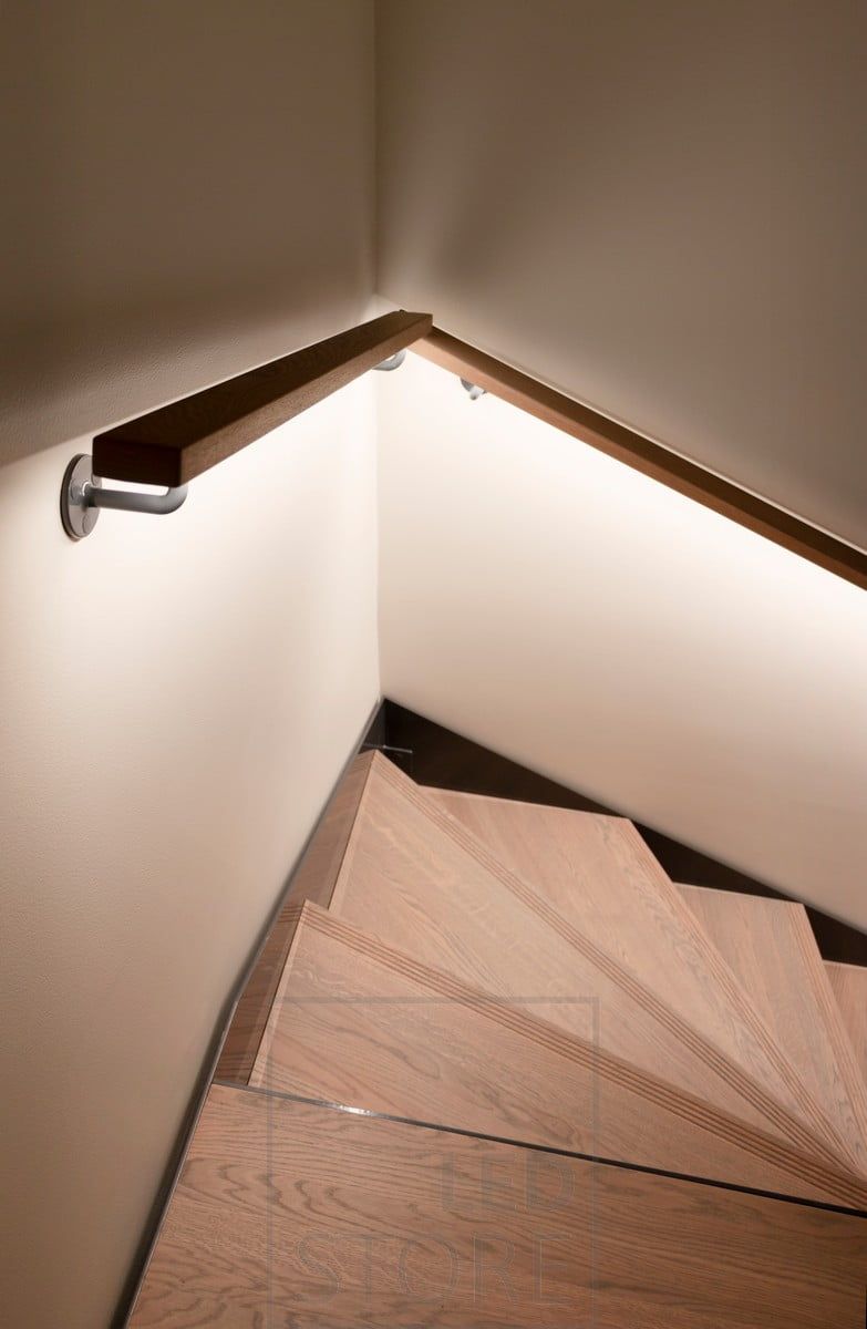 LED strip on the handrail illuminating the steps of the staircase. Led strips create indirect soft light. Ledstore.fi
