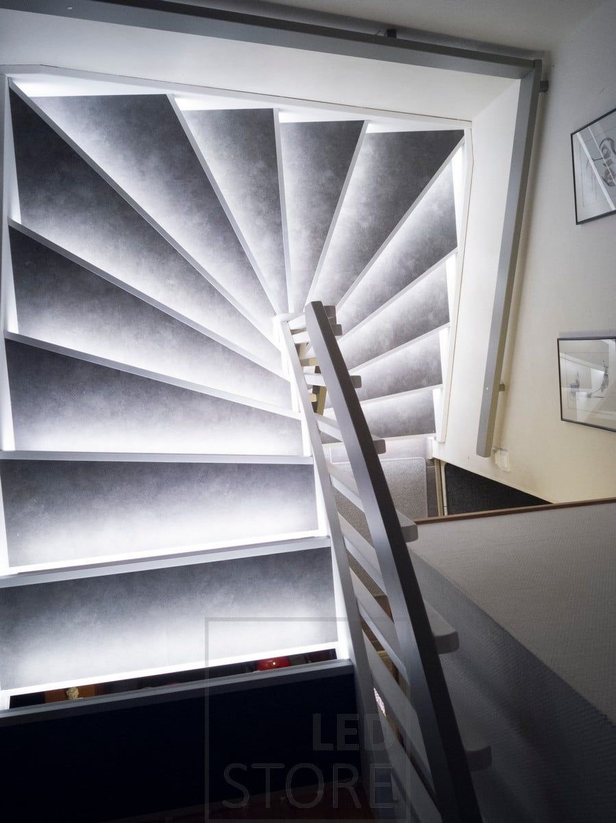 Colour temperature adjustable LED strip illuminating a staircase with indirect light. Ledstore.fi