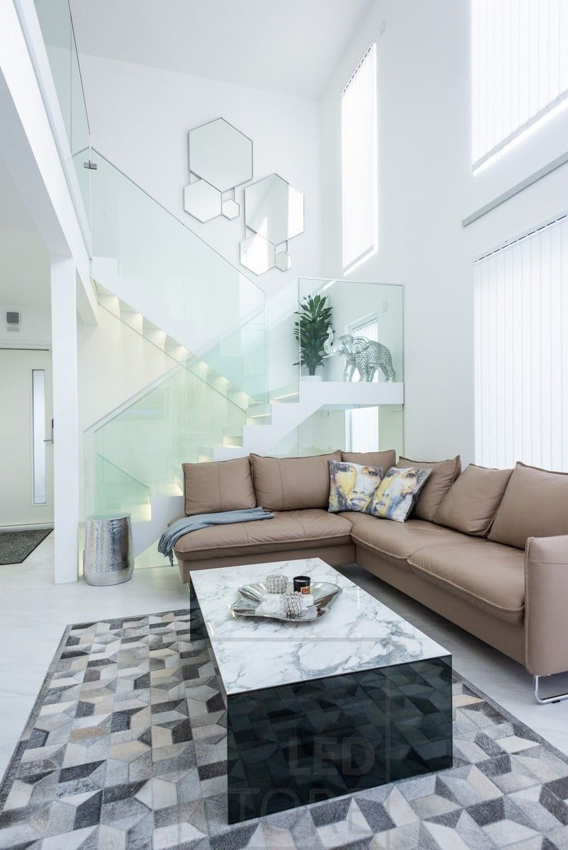 A beautiful and spectacular staircase highlighted and illuminated by LED strips on the steps. Ledstore.fi