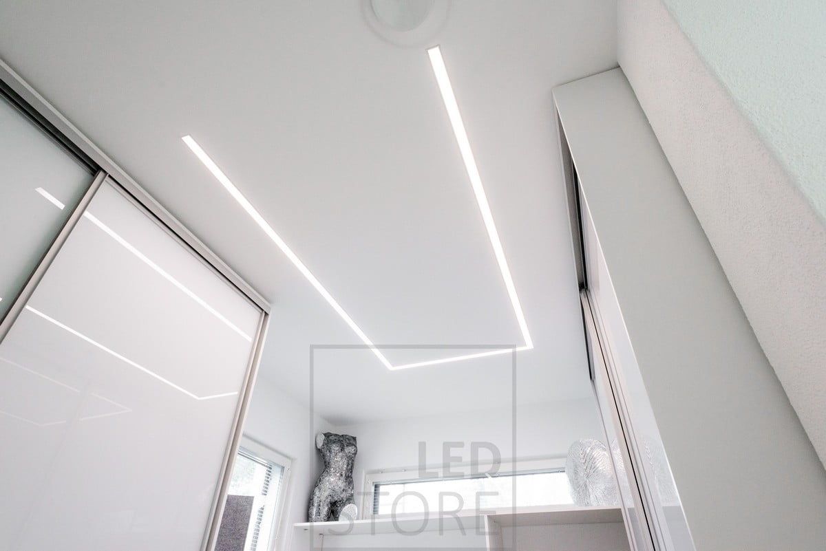 In the wardrobe, a wide flush profile with two LED light strips. The light is efficient and focused where it is needed. Ledstore.fi