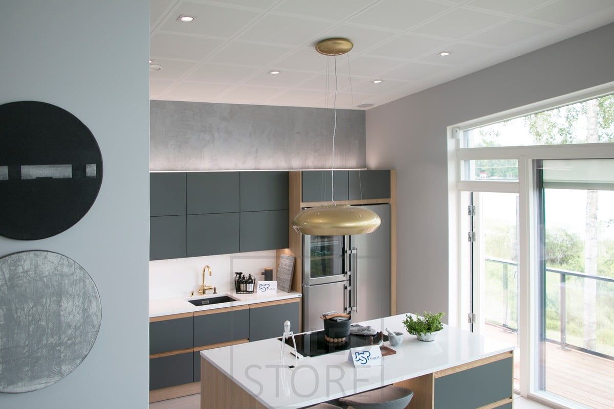 Spotlights as general lighting, LED strip lighting as indirect lighting and flat lighting. In addition, a decorative light on top of the island. Ledstore.fi