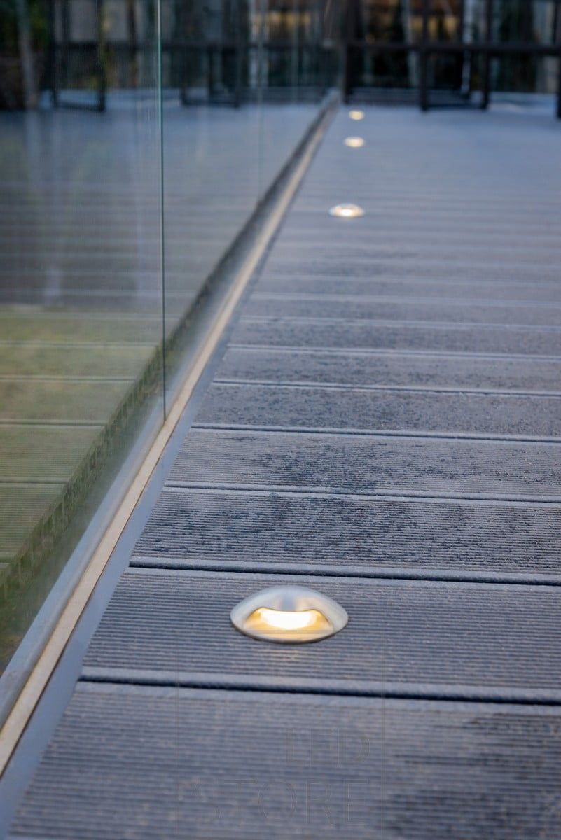 Bidirectionally illuminated atmospheric diffusers next to the windows, embedded in the terrace. Provides soft, indirect light to the terrace. Ledstore.fi