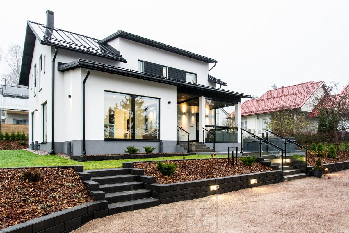 Outdoor lighting on the terrace with bi-directional wall lights, recessed lights in the wall. Ledstore.fi