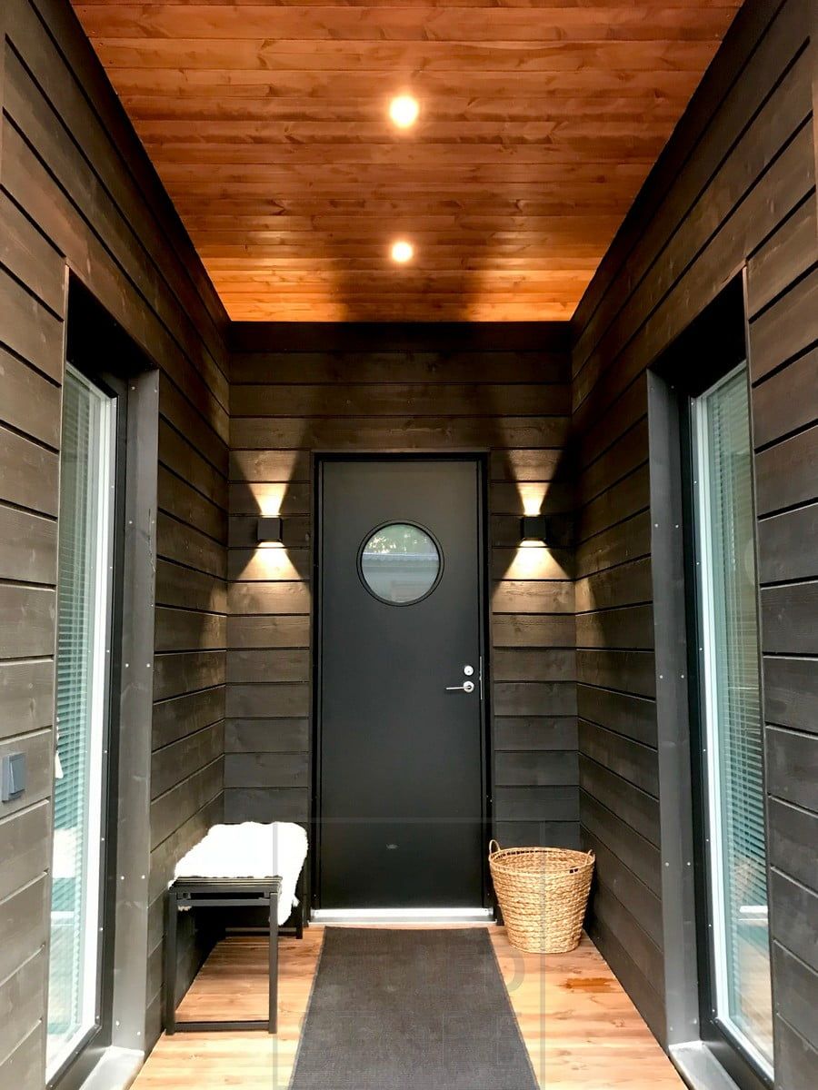Exterior lighting is provided by spotlights on the roof of the terrace and black FUNK luminaires on both sides of the entrance in two directions. Ledstore.fi
