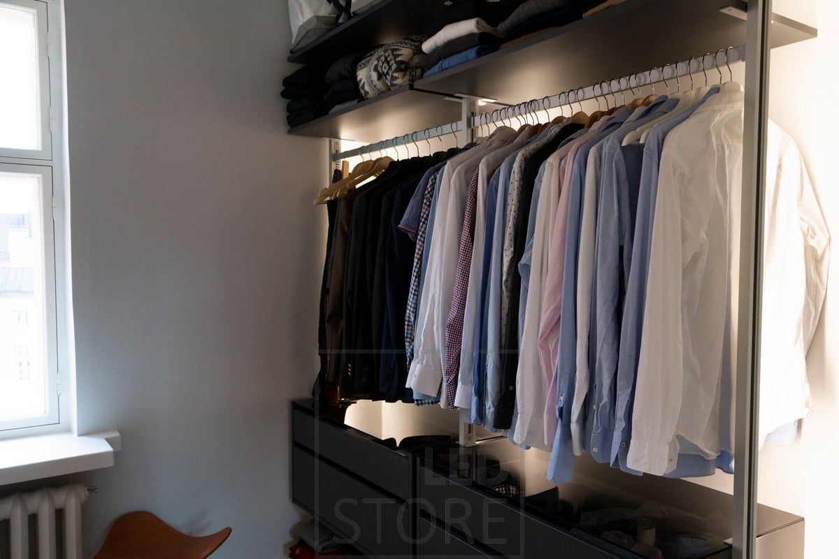 Led strips illuminating clothes and wardrobe with indirect light. Ledstore.fi