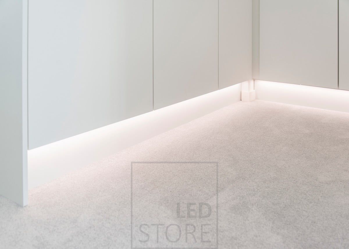 A LED strip light at the base of a wardrobe, illuminating indirect, atmospheric light. Light colour temperature 4000K Ledstore.fi