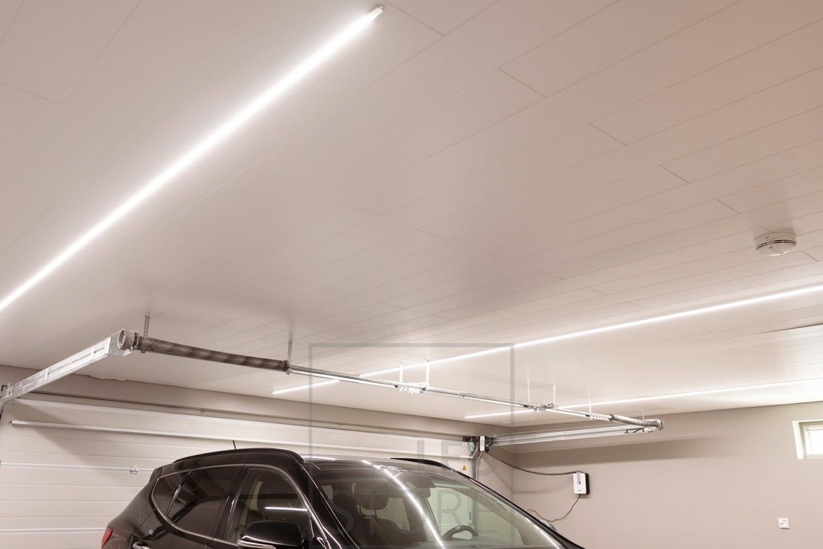 Led strips in narrow surface profiles on a garage roof. Ledstore.fi
