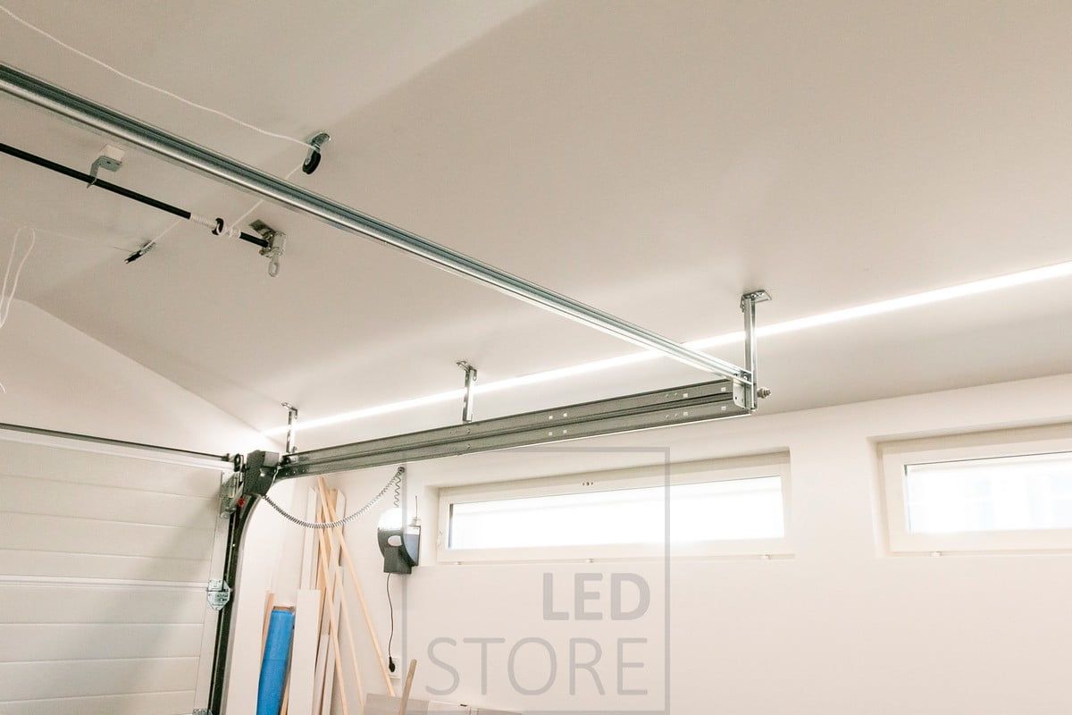 Garage lighting with LED strips in a wide flush profile. Two led strips inside the profile. Ledstore.fi