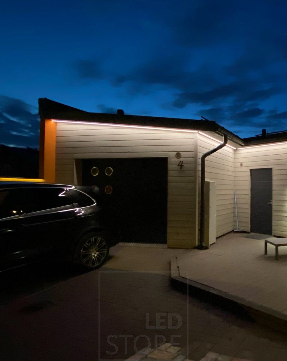 Led strip on eaves illuminating indirect light on facade and yard. Ledstore.fi