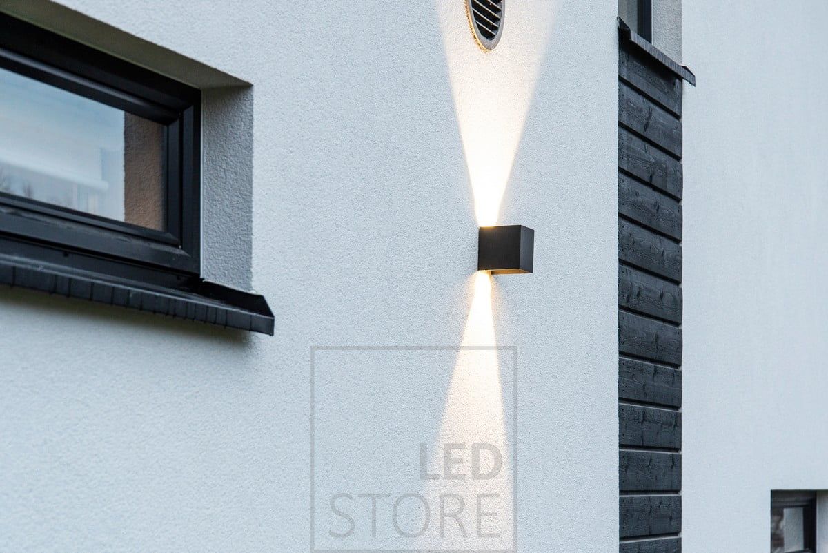 Dimmable FUNK wall luminaire with bi-directional illumination on the facade wall. Ledstore.fi