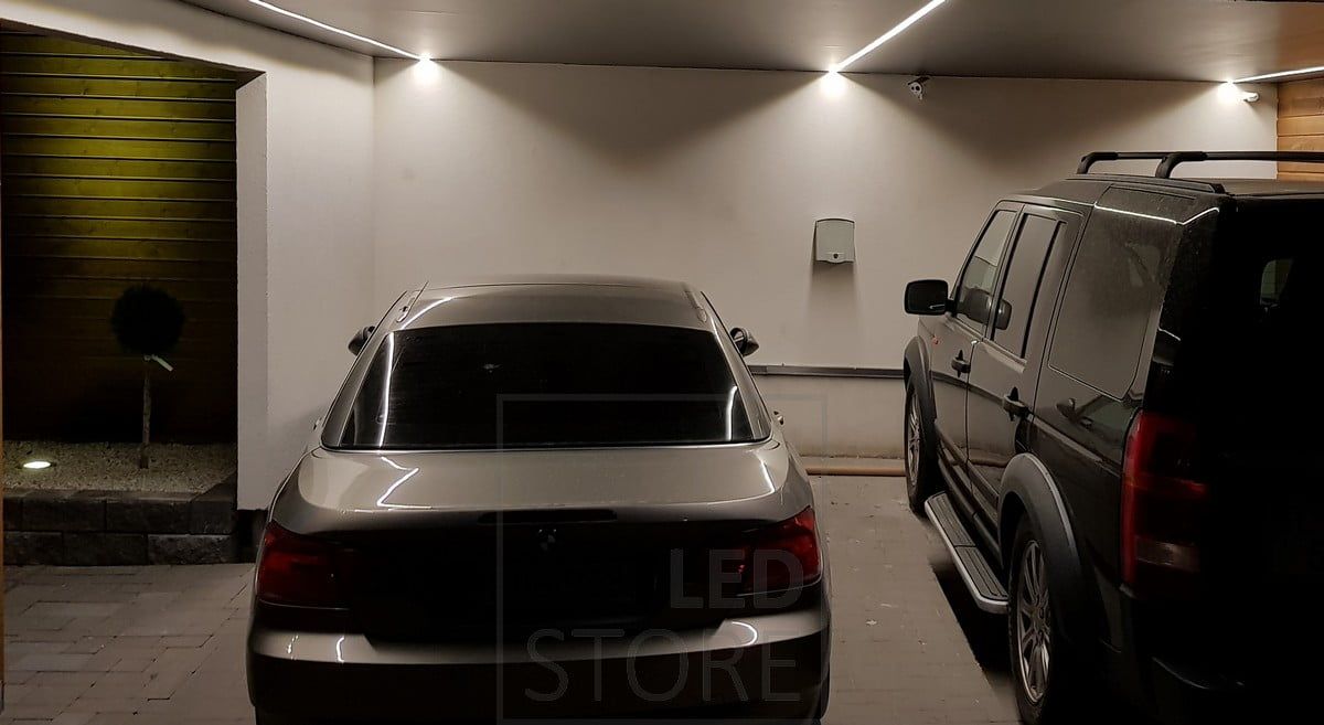 LED strips on the roof of a carport in a low profile surface profile. Ledstore.fi