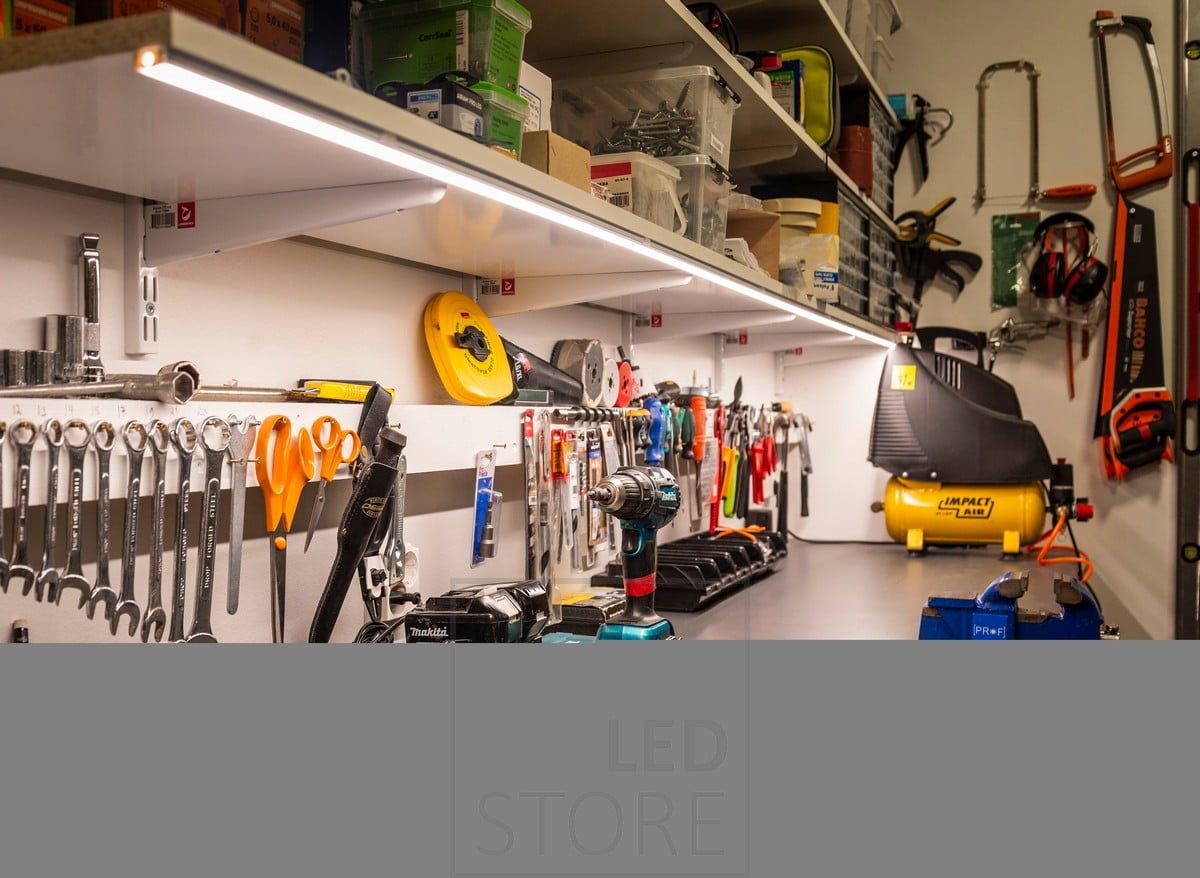 Led strip in a low surface profile at the bottom of the shelf to illuminate the workstation and tools. Ledstore.fi