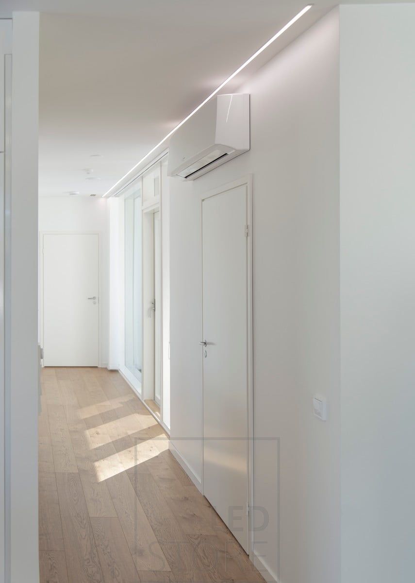 In a narrow flush-mounted profile, the LED strip provides beautiful and minimalist general lighting in the corridor. Ledstore.fi