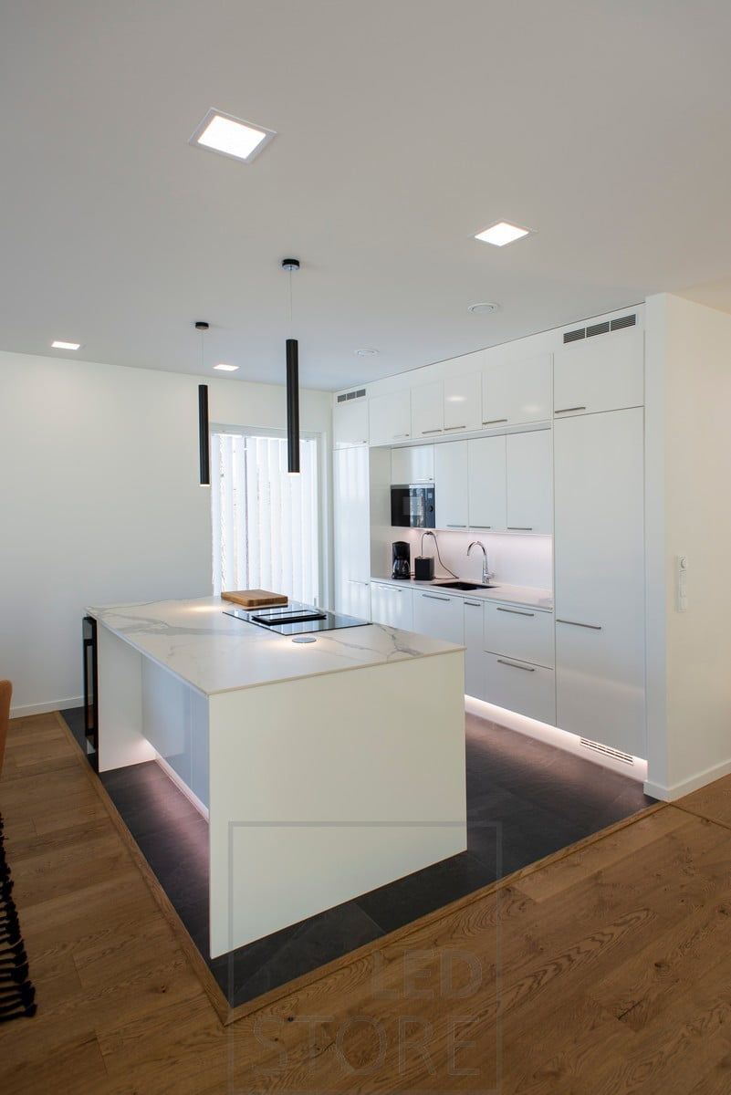 Plinth lighting to add atmosphere and also works as a night light. Panels in the ceiling create good and even general lighting. Ledstore.fi