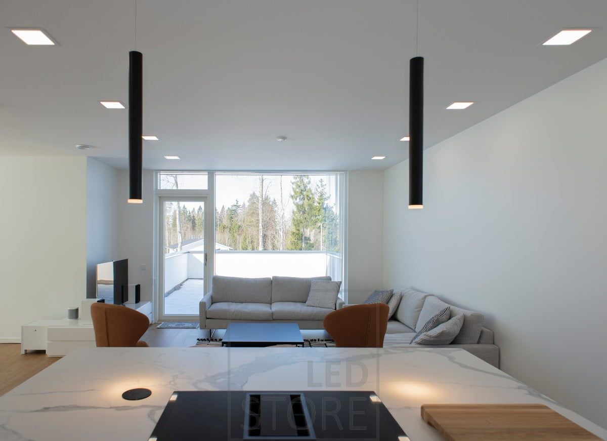 Chimney lamps on the top of the islet and Panel lamps on the ceiling. Ledstore.fi