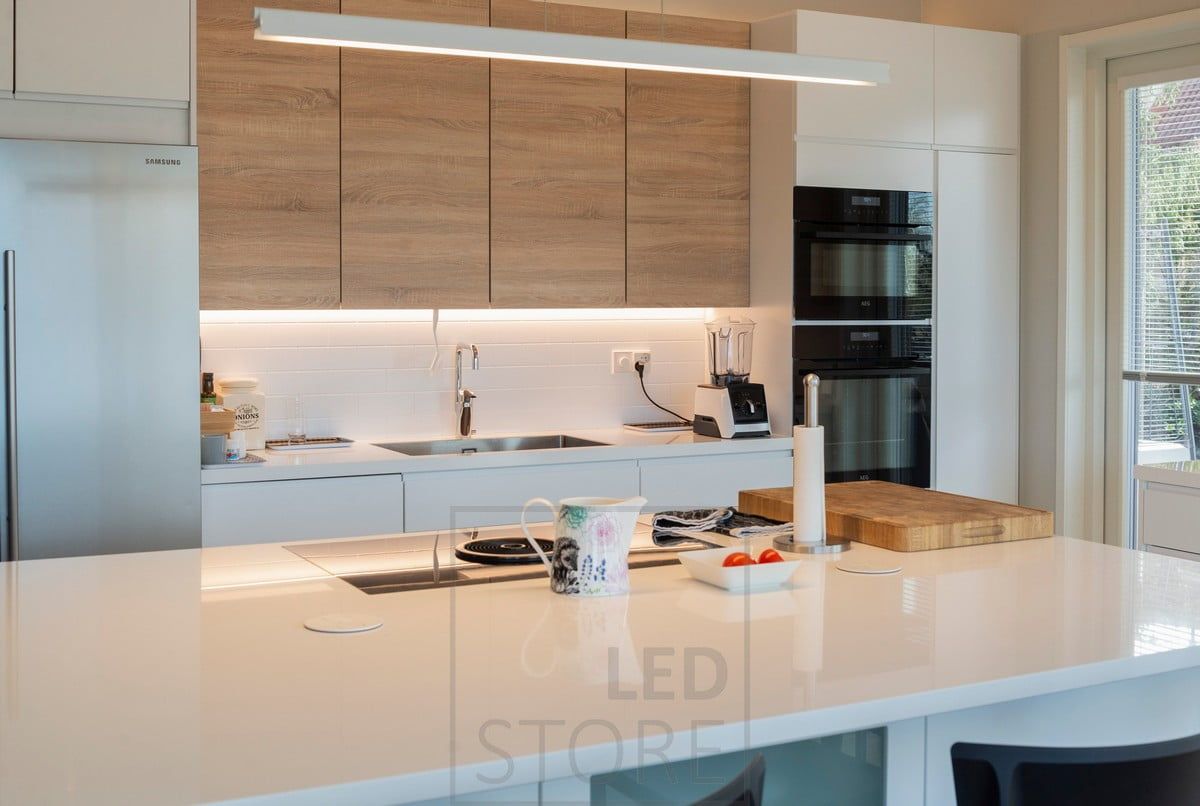 Led strip light in the bottom of cabinets as a work light. Ledstore.fi