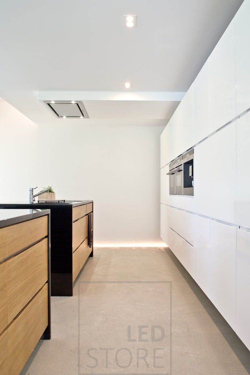 In the kitchen, spotlighting and indirect light in the ceiling in the drop-down lip and in the floor in the groove. Ledstore.fi