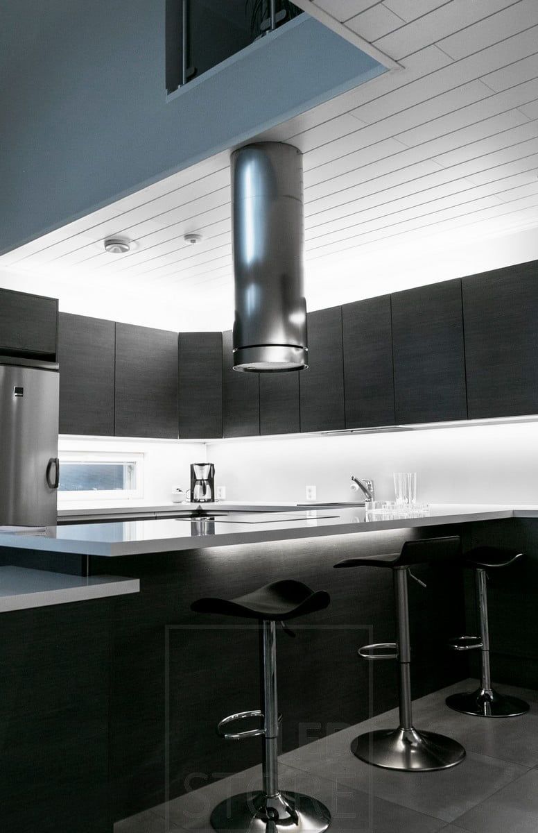 In the kitchen, LED strips on top of the cabinets and on the worktop. Ledstore.fi