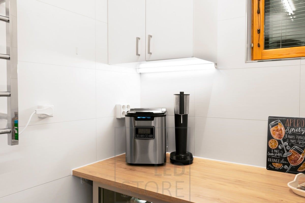LED ribbon in the corner profile of the kitchen cabinet base. Ledstore.fi