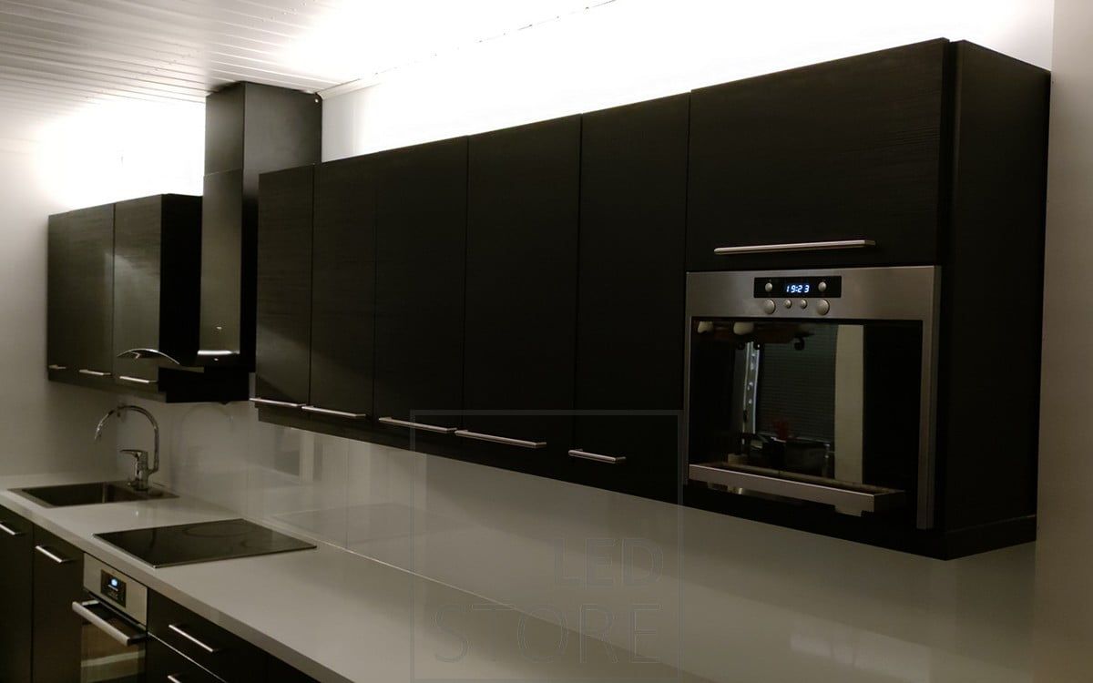 LED strips on top of the upper cabinets to provide indirect light to the kitchen. Ledstore.fi