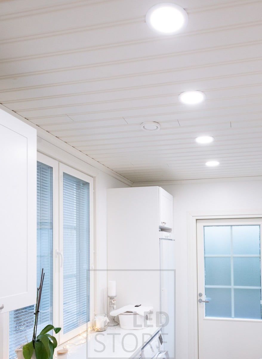 A utility room lit with ceiling luminaires for uniform and efficient lighting. Ledstore.fi