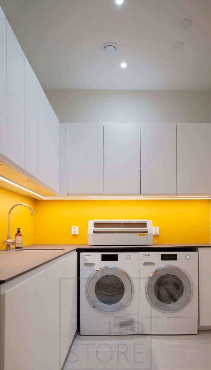 Light brought into the utility room levels with LED strips, mounted on a low profile surface. Spotlights on the ceiling as general lighting. Ledstore.fi