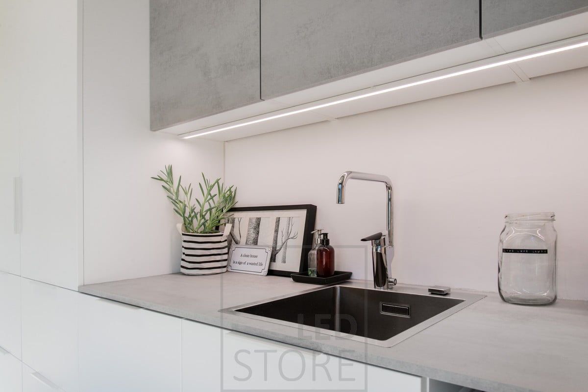 LED ribbon mounted on the bottom of an upper cabinet, mounted on a surface profile. Ledstore.fi