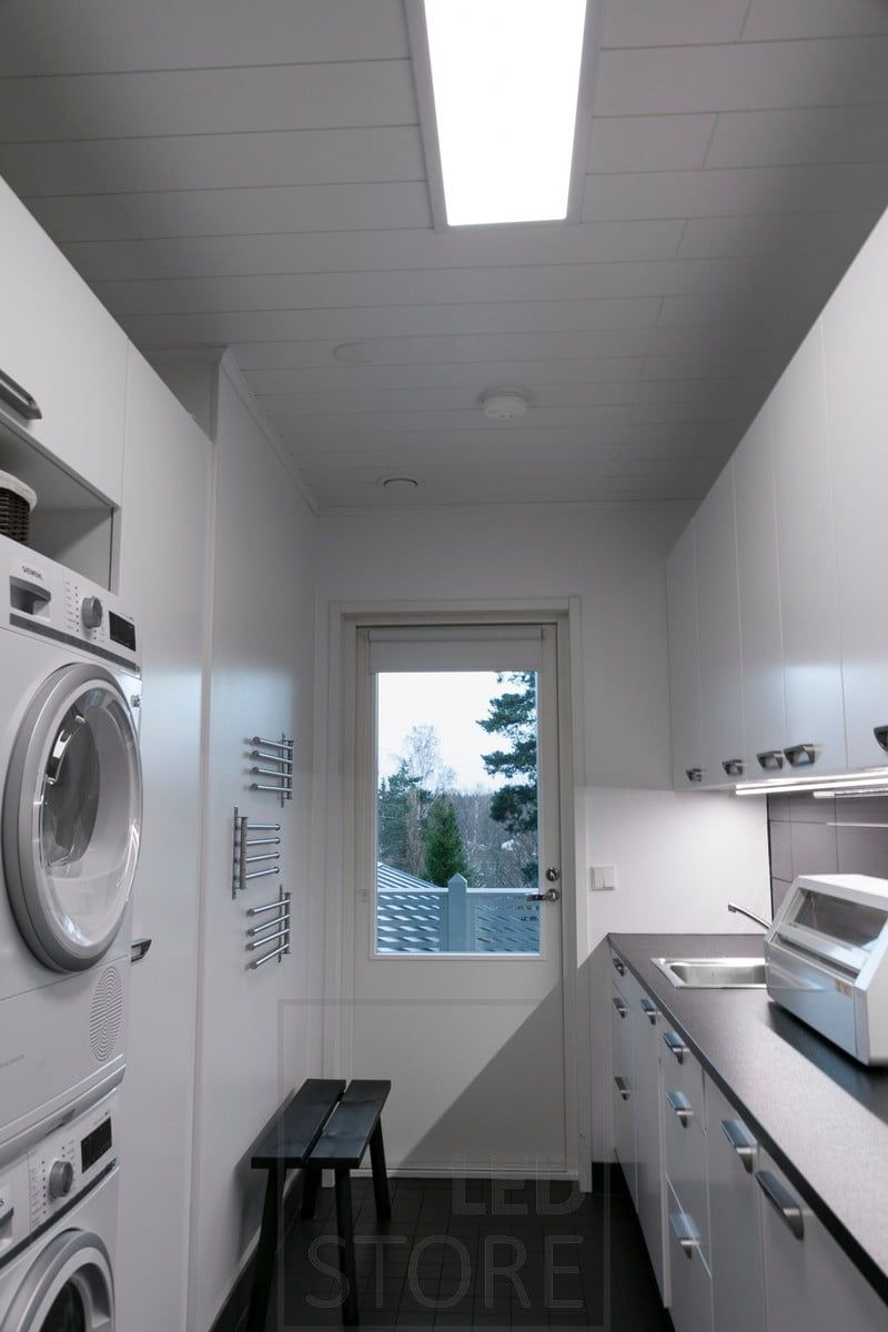 Lighting in a utility room realized with 300x1200 panel lighting. The panel luminaire has a 110 degree opening, it is efficient and does not glare. Ledstore.fi