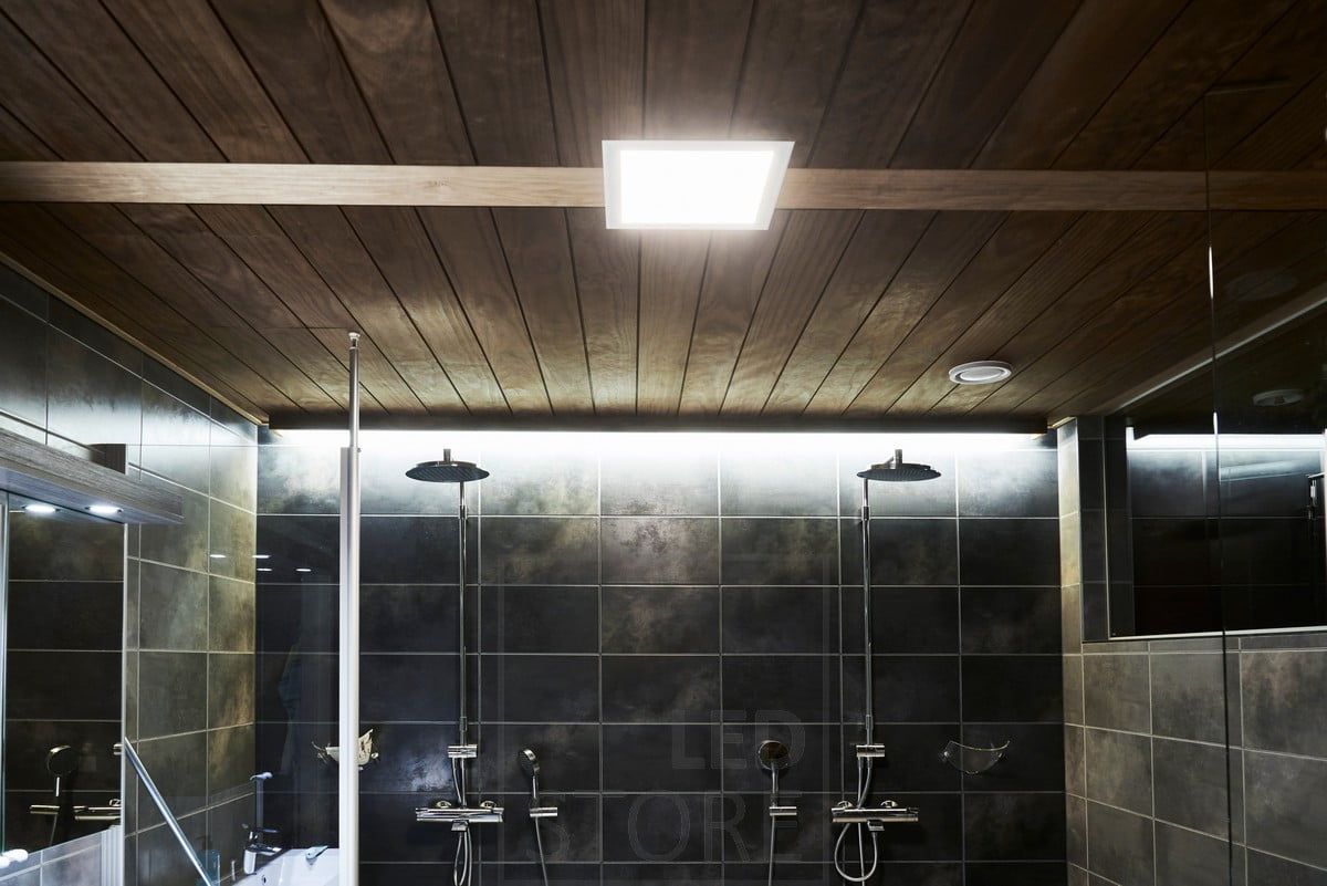 Bathroom panel luminaire combined with an indirectly mounted led strip. Ledstore.fi