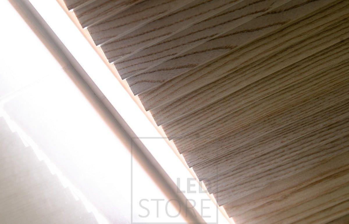 Led strip between ceiling and wall in a groove to provide indirect light to the bathroom. Ledstore.fi