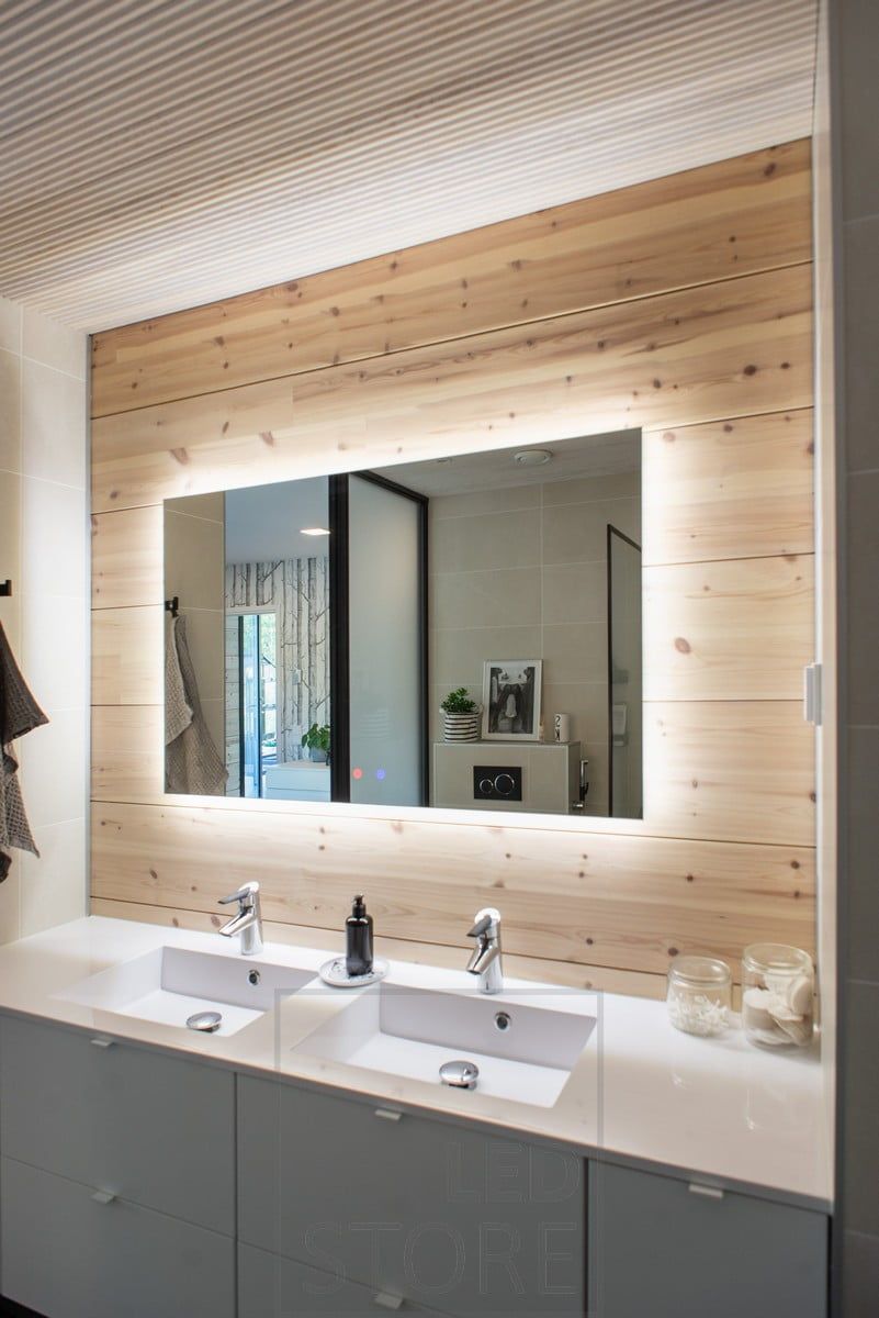 In the bathroom, a 1200mmx750mm light mirror serves as a common mirror for two sinks. Ledstore.fi