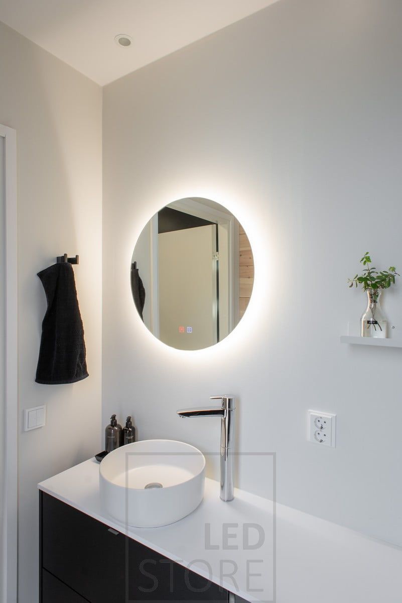 A circular light mirror bringing light to the pool level. Ledstore.fi