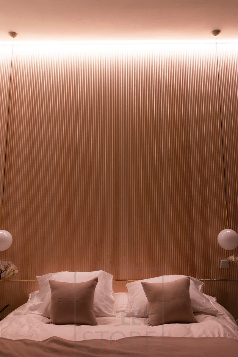 In the bedroom, mood lighting behind the bed in the ceiling highlights the beautiful panelling. Ledstore.fi