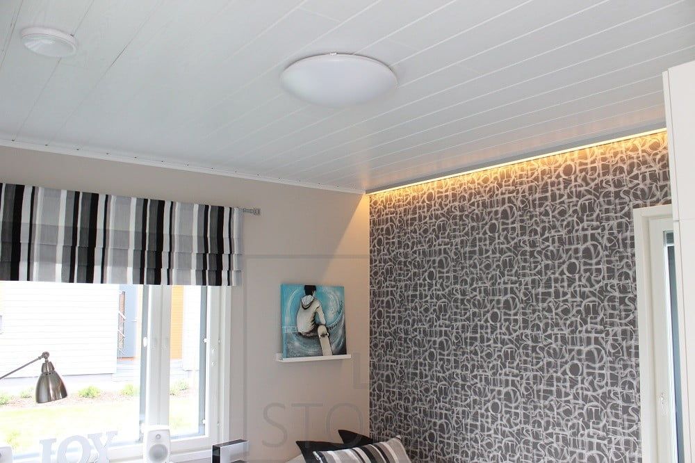 A strip of LED light to create indirect light in the bedroom and accentuate the wallpaper. Ledstore.fi