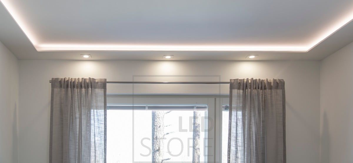 Soft and atmospheric lighting with LED strip and spotlights in a downlight clip. Ledstore.fi