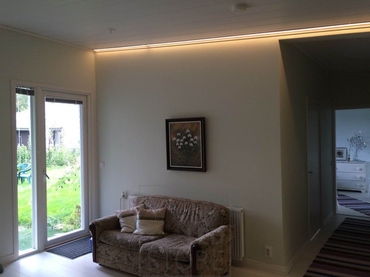 Led ribbon on the edges of the space to illuminate the living room with atmospheric light. Ledstore.fi