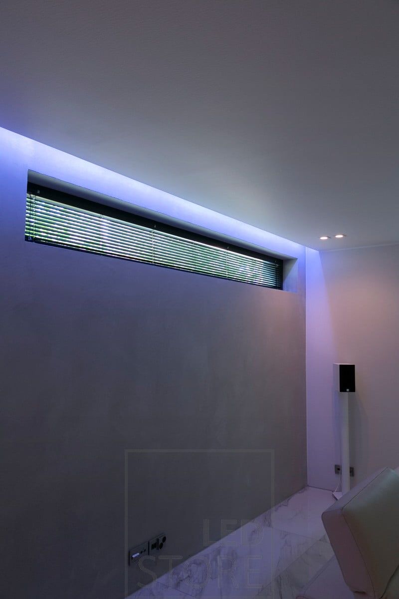 In the living room, RGB ribbon in a groove between the ceiling and the wall for mood lighting. Ledstore.fi