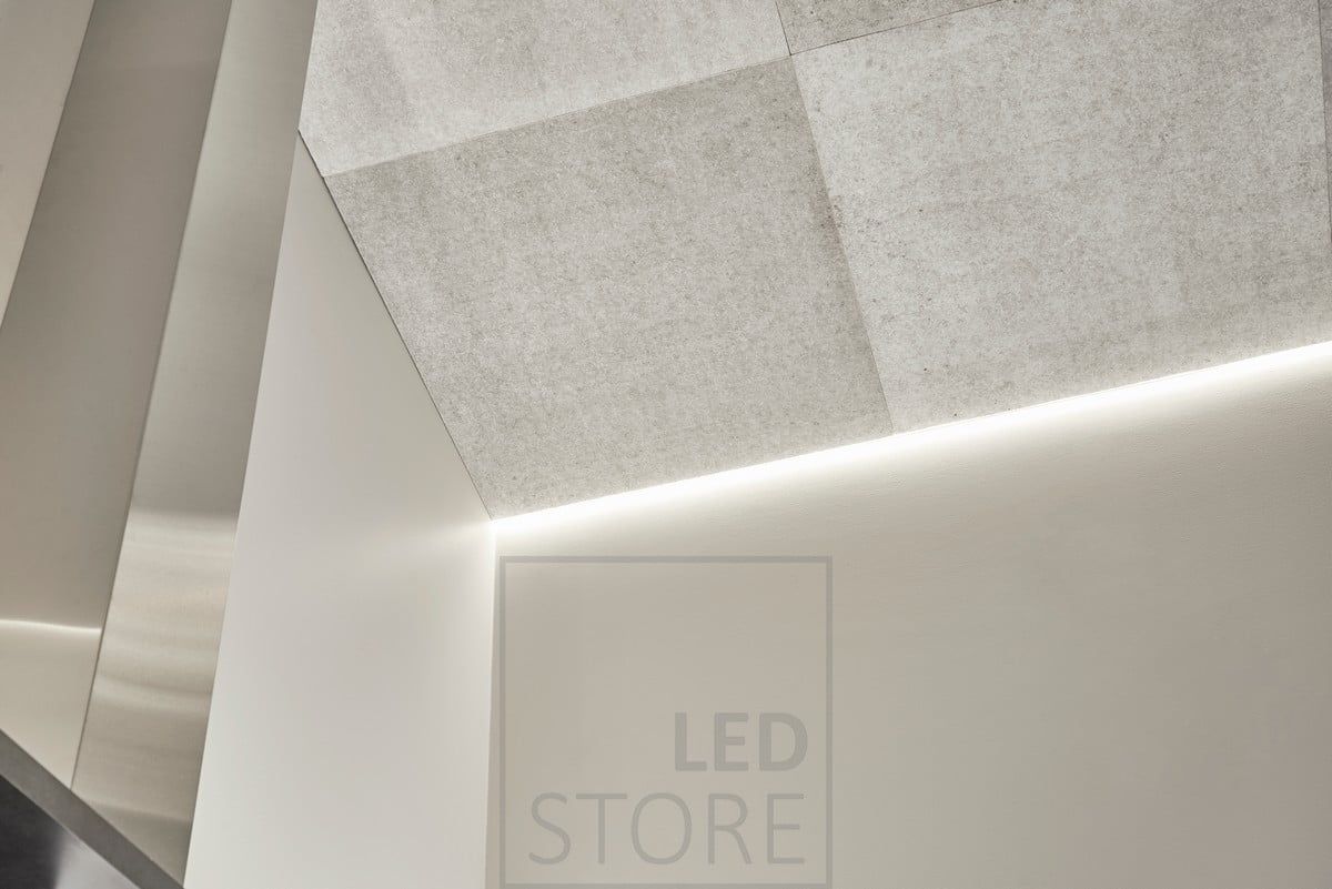 Ceiling to wall mounted LED strip providing indirect mood lighting in the living room. Ledstore.fi