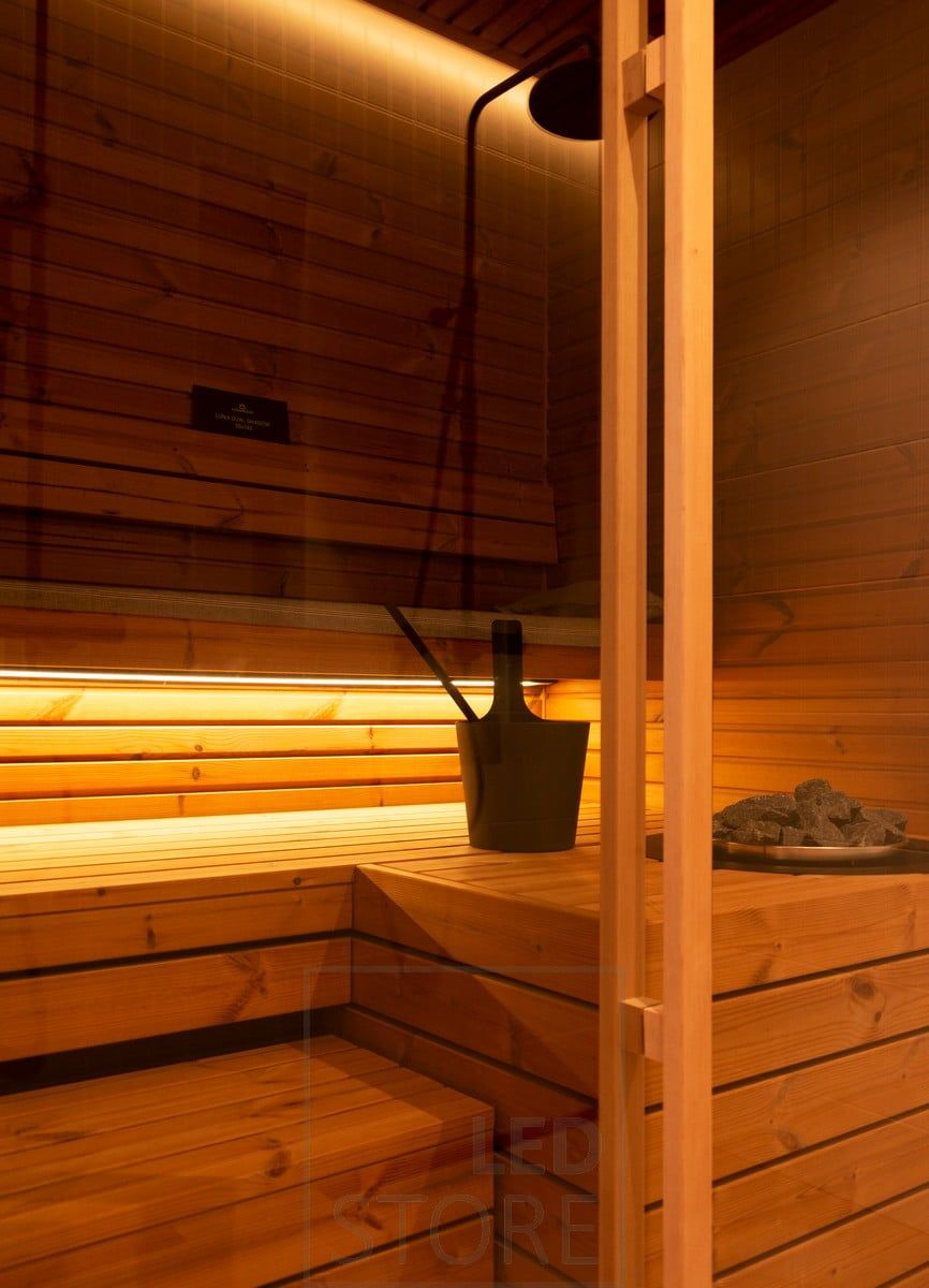 LED lighting logo with white "LED STORE" text in a square, centered on a green background, energy concept