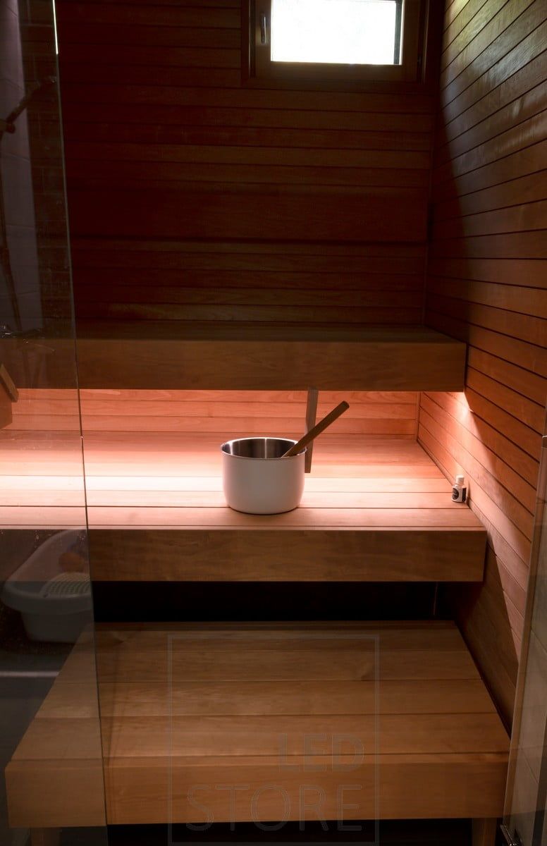 Sauna with led ribbon under the bench