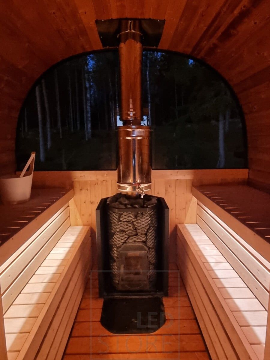 Atmospheric sauna lighting, LED strip lights illuminating indirect light under the ceiling. Ledstore.fi