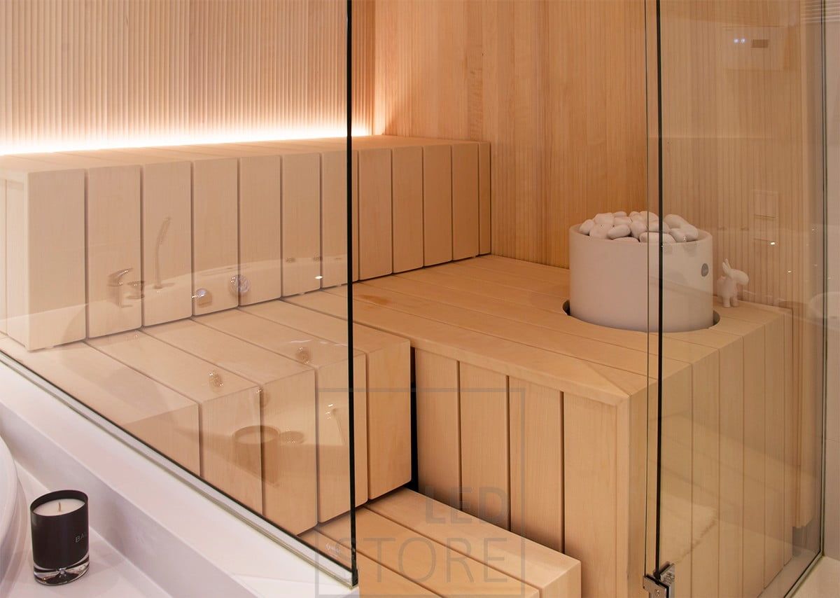 Sauna lighting with a LED strip behind the bench, providing atmospheric indirect light upwards. Ledstore.fi