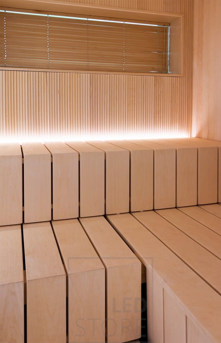 Sauna lighting: led strip in sauna behind bench, illuminating from bottom to top. Ledstore.fi
